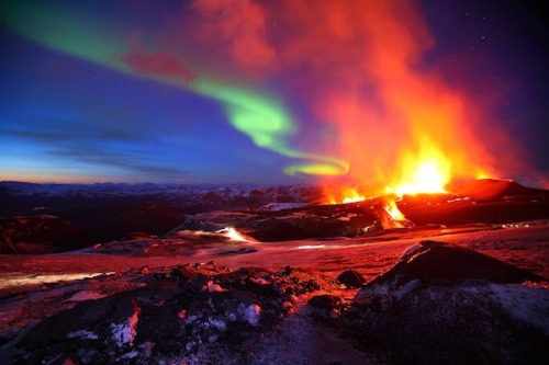 odditiesoflife:  Amazing Volcanic Eruption With Northern Lights, Iceland  After hearing that the Eyjafjallajökull Volcano was erupting, photographer James Appleton made a journey to Iceland. Appleton managed to take these stunning photos of the volcano’s