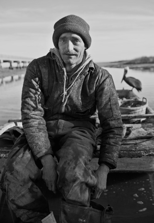 Lamar, the oyster picker, and his partner. Awendaw, South Carolina. Photo by © Yve Assad 