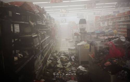 micdotcom:  20 photos show exactly what happened in Ferguson last night (2 of 2)  As dawn crept over Ferguson and its neighboring suburbs, the task of rebuilding after a night filled with tragedy loomed large. And it’s not tragic because stores were