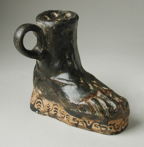 Askos (oil-jar) in the shape of a sandal-wearing foot.  Greek (thought to have been made in Athens),