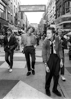 Pinkfled:  The Sex Pistols Walking Down Carnaby Street. Photo By Jill Furmanovsky