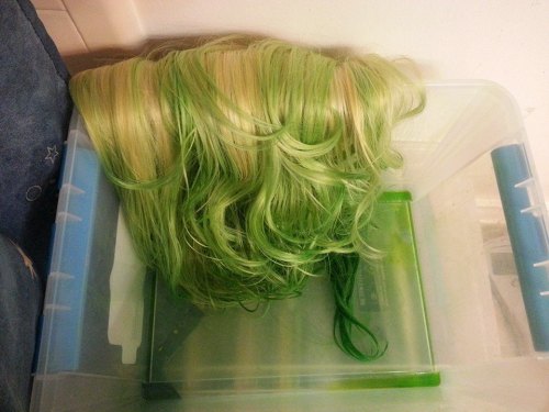 ceratopian:Adventures in wig dyeing! I used a diluted copic marker refill in apple green and it dy