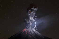 theeconomist:  World Press Photo third prize in the Nature Singles category: “The Power of Nature” by Sergio Tapiro shows a night-time eruption of the Colima Volcano, Colima, Mexico on December 13th 2015. Rock, lava and ash pour out, while the static