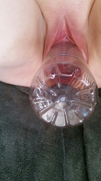 stretchedloose:  holegirl:  Stretching with all my heart ❤  Today I started with the 0.5 ltr in my pussy for 20 min before switching to the 1 ltr bottle as instructed by him after yesterday.  I had the 1 ltr (pic 1 ) in for 15 min and had to cum 2 times