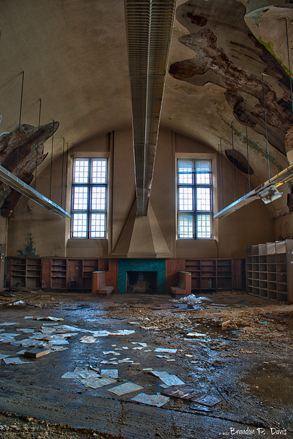bookporn:  copperbadge:  kingsgrave:  bookporn:  Abandoned: Mark Twain Branch Detroit Public Library by Brandon P. Davis Flickr | Tumblr | Facebook  This is the way the world ends…  I always figured if the apocalypse does come, I’m heading for the