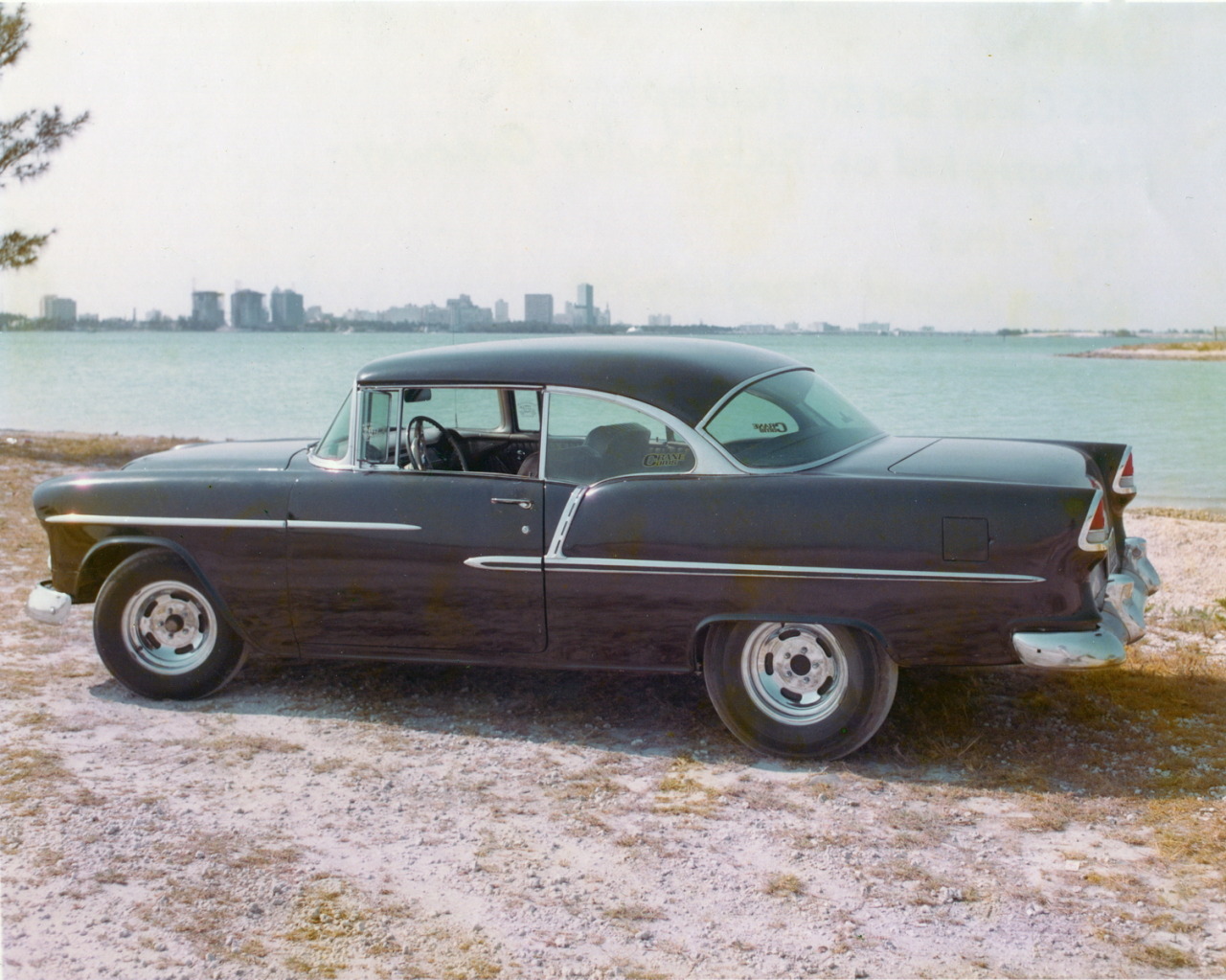 55gassers:  1955 Chevy sport coupe.