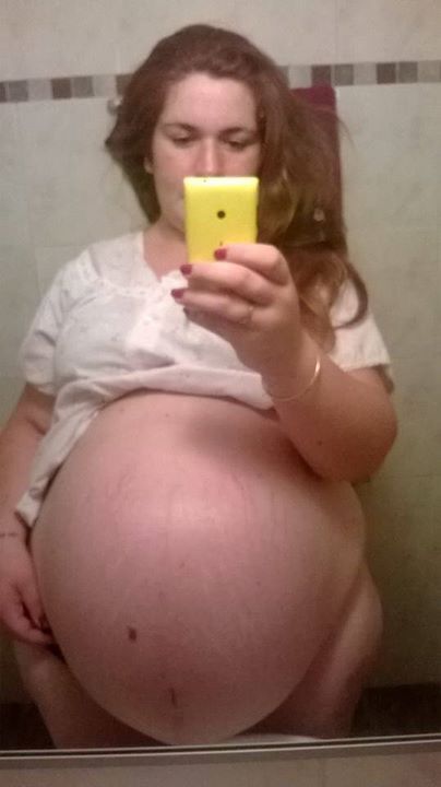 voluptuousfertility: She had grown so large it was difficult to stand, to move. The triplets in her 