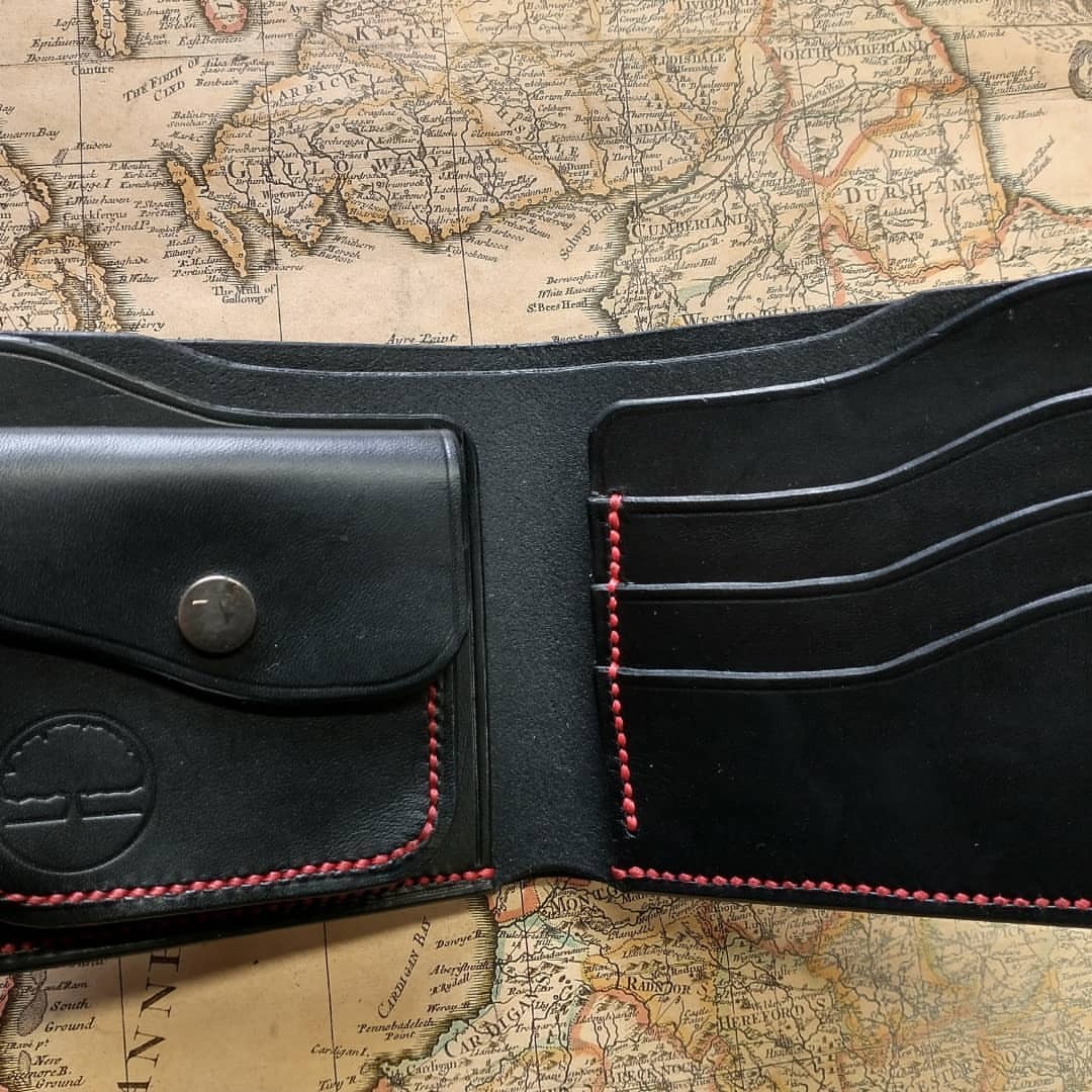 <p>Finally finished. My new Goshawk leather wallet.<br/>
Prototype completed. Don’t look too closely or you will see all of the design changes whilst I was crafting it😁 I must admit that I rather like this design of wallet.<br/>
1.5mm Lamport shoulder in black from Metropolitan Leather with Artisan leather’s red braided thread hand stitching. 3 card slots, 2 receipt pockets, a coin pouch, and a full length cash pocket.<br/>
I may skive the edges down a bit more on the next one. And the card pockets need to be a couple of millimetres bigger.<br/>
Fancy your own handmade leather wallet? Then pay a visit to my website at <a href="http://www.oaksidesaddlery.co.uk" target="_blank">www.oaksidesaddlery.co.uk</a> and place your order.<br/>
#oaksidesaddlery #wallet #leatherwallets #handcrafted #madebyhand #madeinengland #coinpouch <br/>
<a href="https://www.instagram.com/p/CVXsTYXjkvx/?utm_medium=tumblr" target="_blank">https://www.instagram.com/p/CVXsTYXjkvx/?utm_medium=tumblr</a></p>