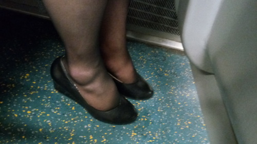 Returning from my visit to London, wearing jet black Silkies with 60mm wedge heel court shoes