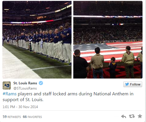 kickoffcoverage:  Rams players enter field with “hands up, don’t shoot” salute