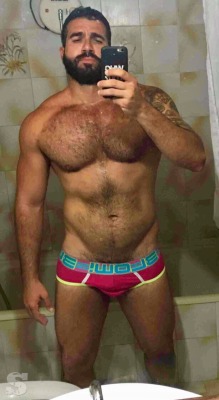 stratisxx:Sexy Arab stud… I love furry bushes sticking out of speedos or underwear 