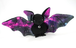 beezeeart:  I’m really stretching the last of this galaxy fabric for all its worth :) I was able to use some scraps for the years and I was super frugal about cutting those wings out. I also gave this little bat a gem on its chest because I thought