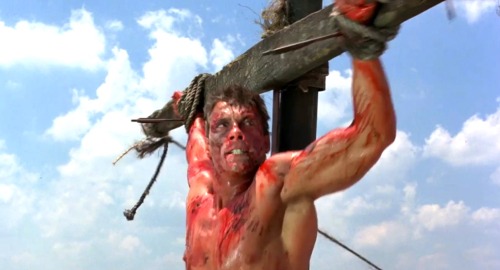 ropermike:Jean-Claude Van Damme in Cyborg (1989). More pics here.A mercenary is crucified on the mas