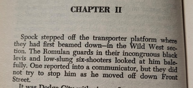 a passage from chapter two of 'the price of the phoenix'; "The Romulan guards in their incongruous black levis and low-strung six-shooters looked at him balefully"