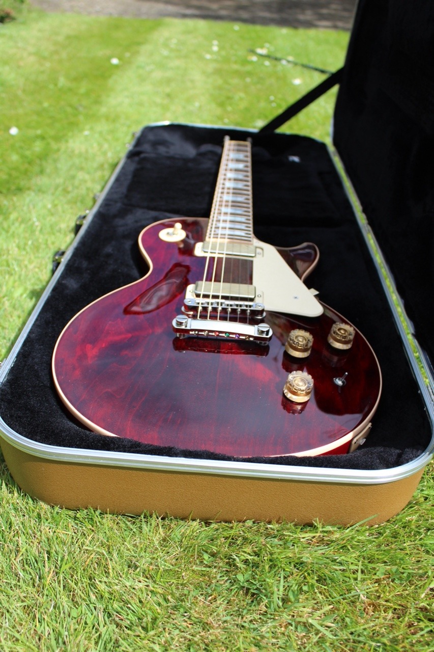 glorifiedguitars:  My New Gibson Les Paul Deluxe 100th Anniversary in Wine Red 