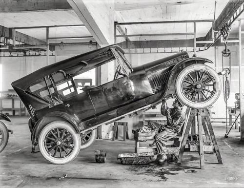 historicaltimes: Studebaker automobile in repair shop with garage mechanic, c. 1919 via reddit