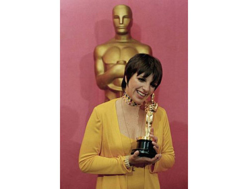 Liza Minnelli with her Best Actress Academy Award, wearing Halston in 1972