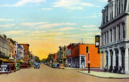 Postcard: &ldquo;Main Street, Business Section, Olney, Ill.&rdquo; circa 1940.Driving cross-country 