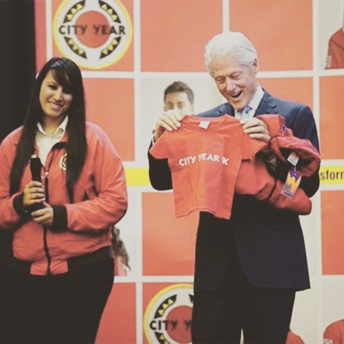 How cute is this? President #BillClinton receives a miniature @CityYear shirt for his granddaughter 