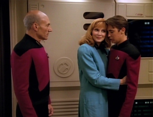 startrekhugs:[Image: Beverly hugs Wesley while Picard watches. From Remember Me. Image from Trekcore