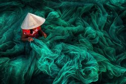 sixpenceee: A woman creates a fishing net