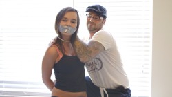 &ldquo;Good Girl&rdquo; with Laney is now available at www.seductivestudios.com  Laney has been kidnapped. She wakes up on a bed, wearing jeans, a tank top and white ankle socks. Her mouth is covered with duct tape. Her hands are taped behind her back