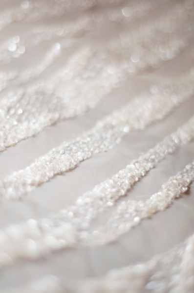 eliesaab:Ivory couture gowns dressed with lace and feathers, sequins and pearls.
