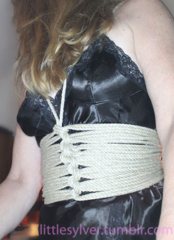 The start of a fun evening.Sir wanted to play with his toy and his new ropes, so I will be posting some of the results of his very fine handiwork. This rope corset felt wonderfully restrictive.
