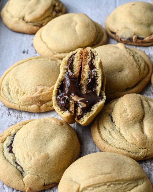 sweetoothgirl:Peanut Butter Cup Stuffed Cookies gimme gimme gimme!!