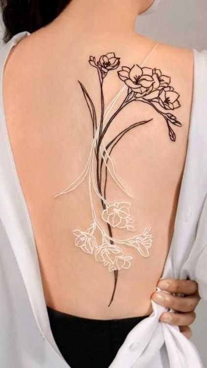 tattooartoftheworld:  Flowers tattoo    #tattoo #ink #art #best #design #idea #tattooforyou #inkedgirl #tattooforman