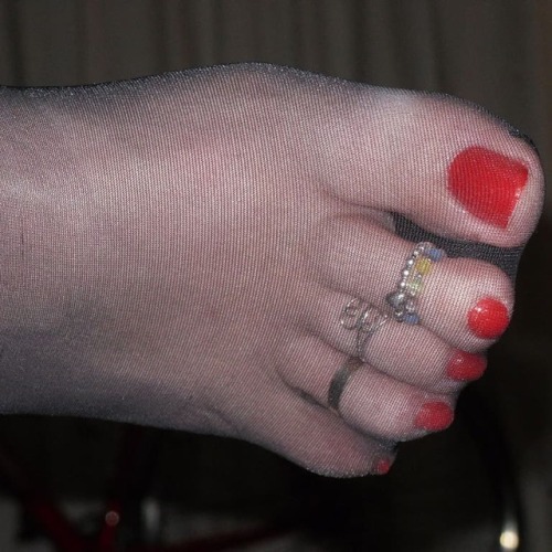 Myself #footcloseup in #blackpantyhose #toerings #pedicures #redtoenails #nylontoes #pantyhosetoes #