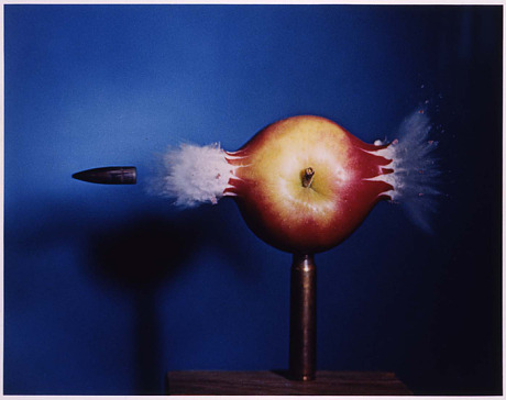 sixpenceee:  Bullet through an apple, taken by a high speed camera. 