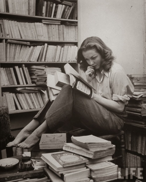 French actress Barbara Laage, “Alone in Her Apartment Reading”, photographed by Nina Lee