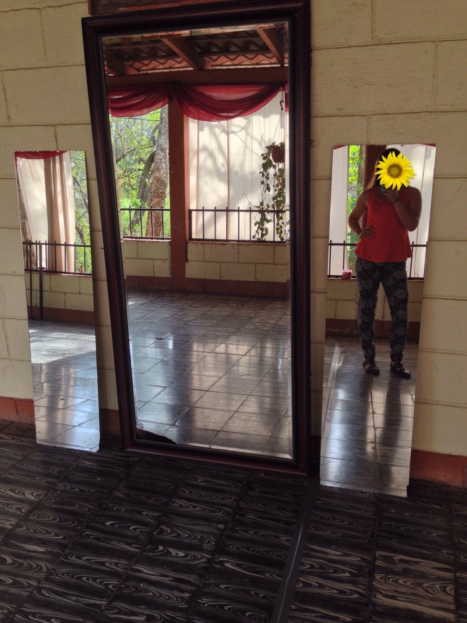 I found mirrors on one side of my host moms wrap around porch.
