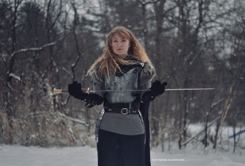 and-speak:here they are in all their glory! @bitecore sporting the bucket armor chestplate in the lovely snowfall. [image description: photos depicting a white person with long blonde wavy hair and bangs, wearing metal armor with black clothing beneath.