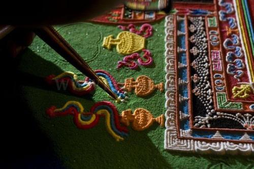 The Tibetan Sand Mandala,The art of sand mandala’s or sand painting is a Tibetan Buddhist trad