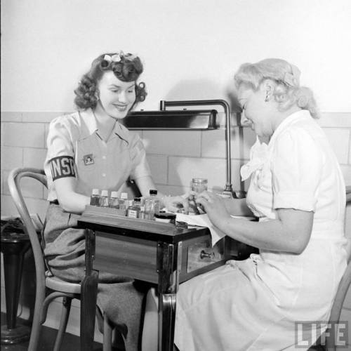 Otis Elevator Company provides manicures to keep morale high(William C. Shrout. 1942)