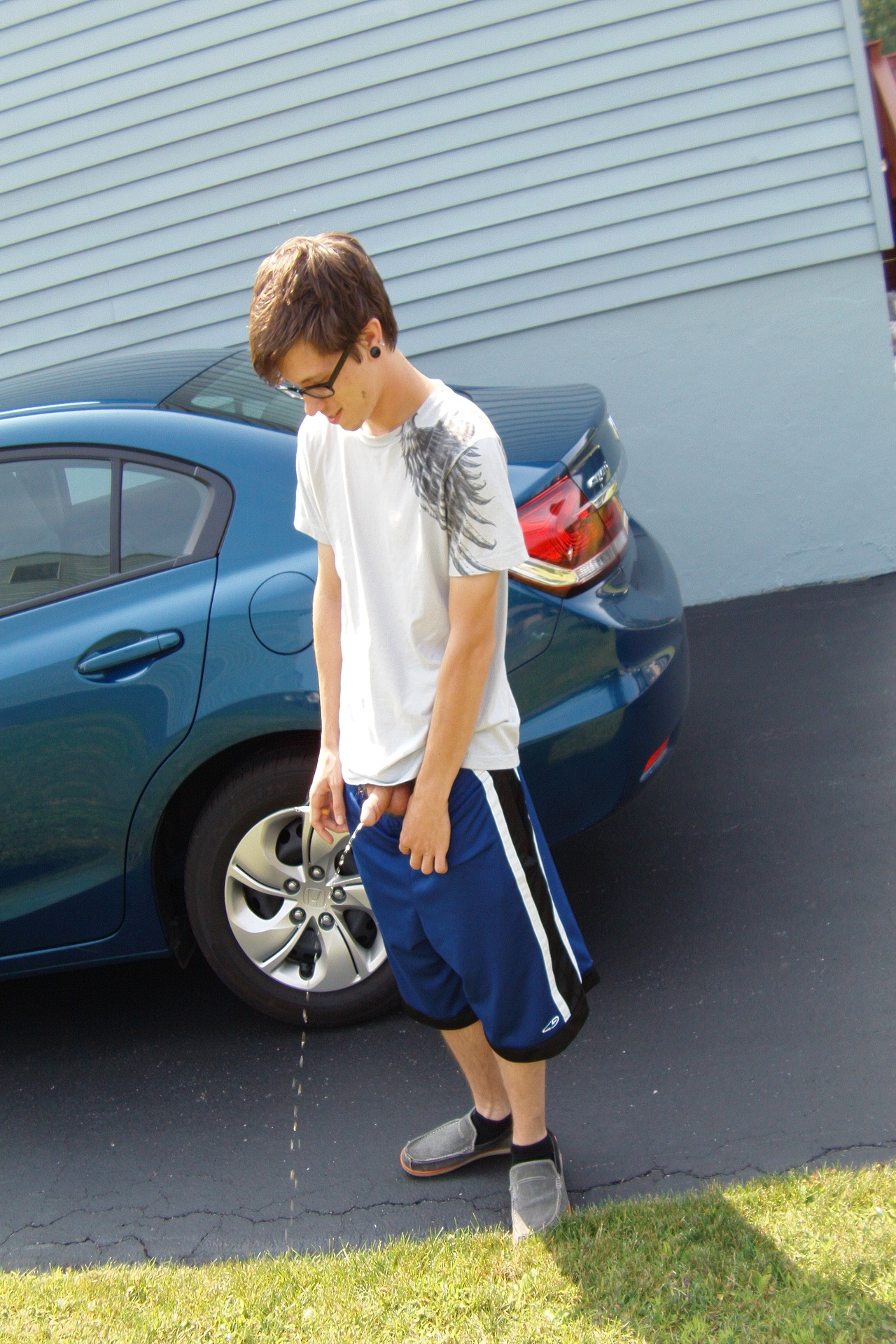 nakedoutdoorguys:  Pissing in front of his house