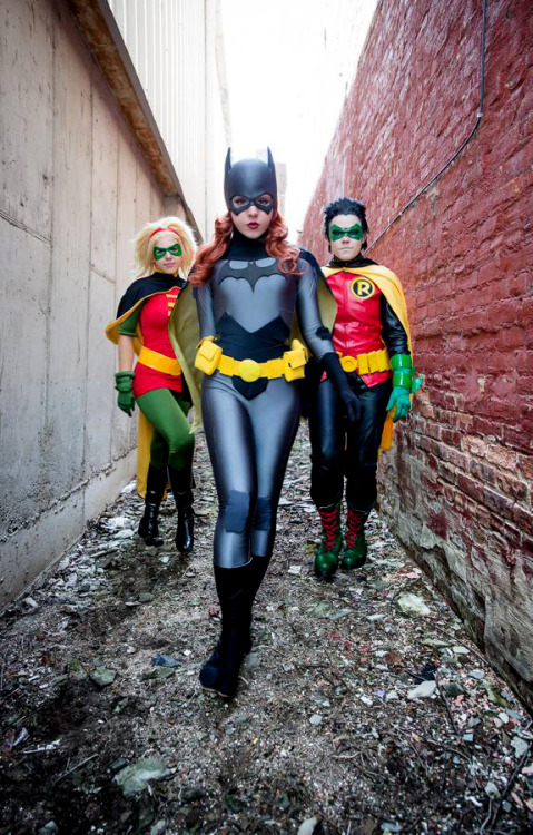 gailsimone: cosplayfanatics: Batgirl and Robin… and… what? Another Robin!? Cosplay By&