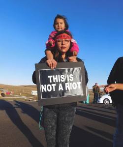 eyesarecrummy:The only riot you’ll see on the front lines is my niece. Forget what you heard. We come in prayer. #RiotCatt #NoDAPL #mniwiconi