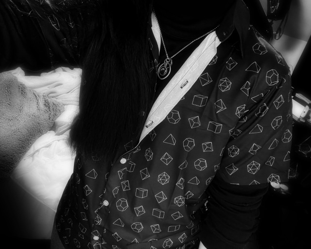 Polyhedral dice shirt makes a rare appearance. adult photos