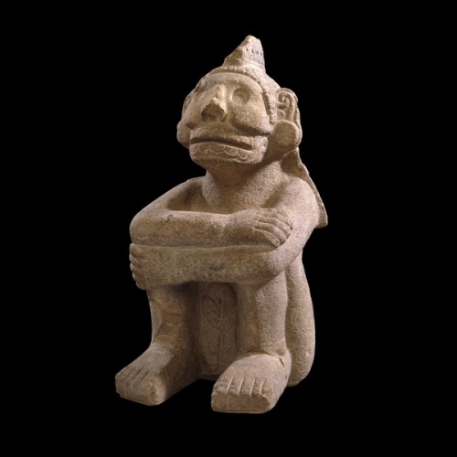 Sandstone seated figure of Mictlantecuhtli Mexica*, AD 1325-1521 From Mexico This sculpture represen