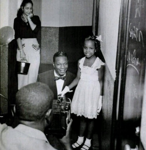 deweydell25:  Great vintage photo of 7 year old Gladys Knight meeting her idol Nat King Cole in the 1950s. (Via Pinterest)