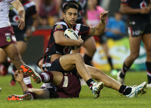 Shaun Johnson and Jacob Lillyman of the New Zealand Warriors