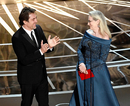 Javier Bardem and Meryl Streep speak onstage during the 89th Annual Academy Awards