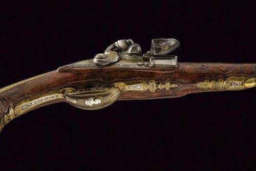 Ornate flintlock pistol crafted by Diego Zanoni of Brescia, Italy, mid 18th century.from Czerny’s In