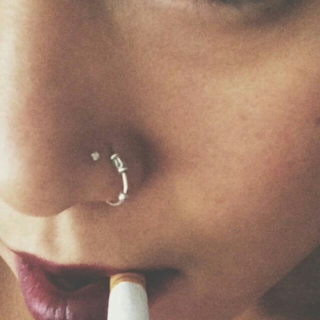 Cute girl with nose piercing