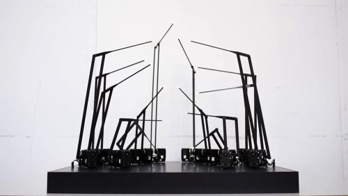 itscolossal:WATCH: A Kinetic Sculpture of 15 Moving LEDs Mimics a Walking Person [video]