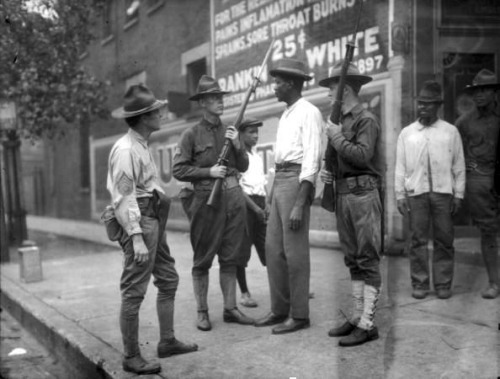 thesociologicalcinema: A black man is confronted by white soldiers during the red summer.&ldquo;