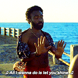 nofrauds:Rihanna as Kofi Novia and Donald Glover as Deni Maroon in Guava Island (2019). ♫ Do love me